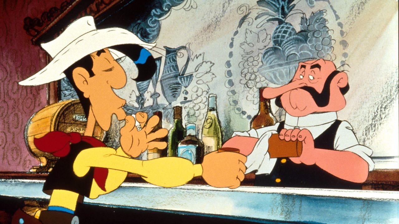 Lucky Luke bestellt beim Barmann einen Drink im Saloon